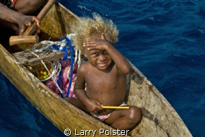 The unusual blonde hair of some of the local children fou... by Larry Polster 